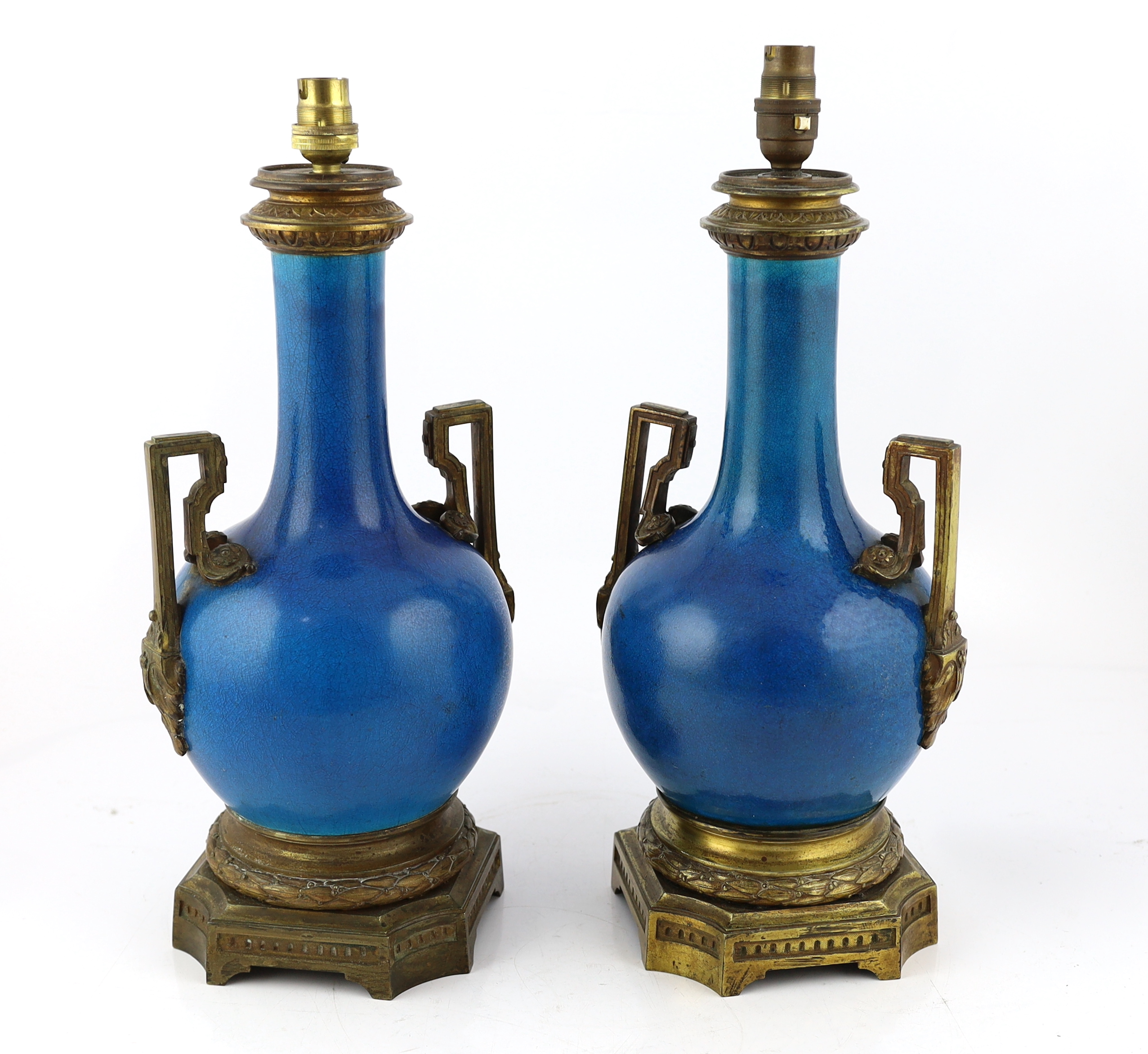 A pair of Chinese or Japanese turquoise-glazed bottle vases with Louis XVI style ormolu lamp mounts, late 19th century